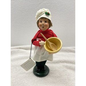 Byers choice caroler baking cookies with mixing bowl